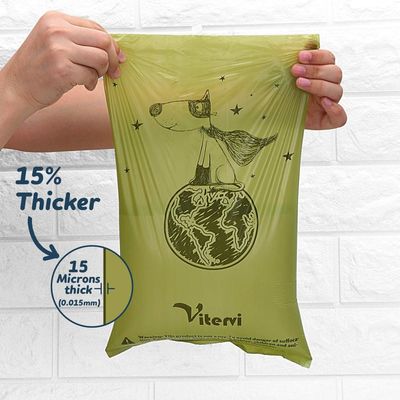 L'abitudine ha stampato la carta - sacchetti di plastica biodegradabili isolati per la poppa del cane